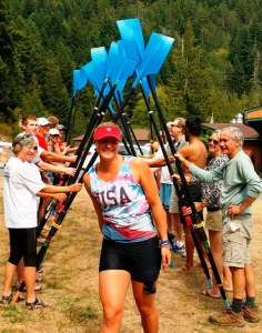 Members of the Olympic Peninsula Rowing Association host a victory celebration for Elise Beuke