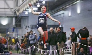 Jasmine McMullin competes in the triple jump at the 2016 University of Washington Indoor Invitational on Jan. 30.