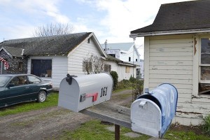 Sequim City councilors agreed on Dec. 8 to lease two homes north of the new Civic Center to eliminate complaints about bad tenants while creating utility truck parking.