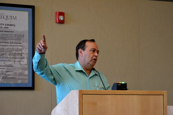 The Rev. Randy Hurlbut of Sequim Valley Foursquare Church speaks with Sequim city councilors on June 13 about why he is in favor of firework sales in city limits. He fears if fireworks are banned