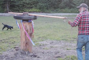 Delman Sage explains how one of the newly built trail obstacles works as a way to demonstrate a horse and rider’s ability to work together.