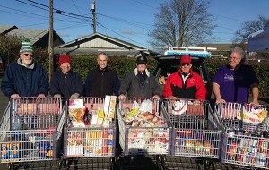 With 600 pounds of food are Cranksgiving volunteers