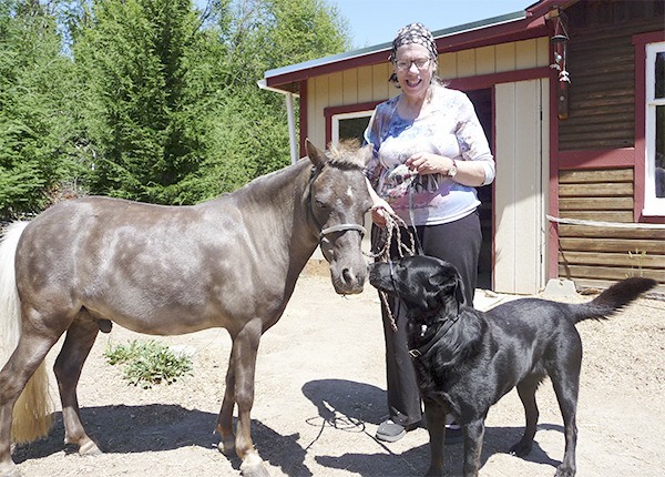 As owner Deborah White lightly controls their leads