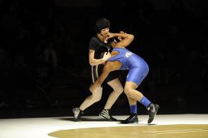 Sequim’s Kiara Pierson (120 pounds) tries to avoid a grapple by Miguel Gaspar-Hernandez of North Mason on Dec. 16.