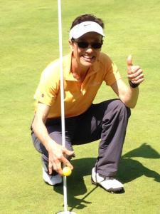 Marine Hirschfeld of the Dungeness Women 18-Holers golf group celebrates a hole-in-one on at hole No. 17 at The Cedars at Dungeness on May 12.