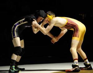 Kiara Pierson battles Matt Thomas of Kingston on Jan. 12 at 113 pounds. She avoided a pin at multiple points but lost 12-0. Pierson is ranked No. 4 among all girls in the 115-pound weight class by washingtonwrestlingreport.com.