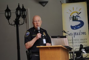 Sequim Police Chief Bill Dickinson speaks at a Sequim-Dungeness Valley Chamber of Commerce meeting on Aug. 9.