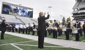 The Sequim High School band rehearses with other prep bands before playing at halftime of the Sept. 19 University of Washington-Utah State football game