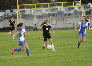 Sequim forward Jessica Dietzman takes the ball toward midfield on Sept. 13 against the Olympic Trojans. Sequim Gazette photos by Matthew Nash