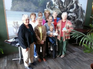 Moriah Seaton is given a check for $2000 to continue her education. Members of Chapter IV of PEO are Rose Moorhead