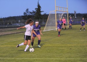 Sequim’s Yana Hoesel looks to go to the net against the North Kitsap Vikings on Sept. 22. The Wolves couldn’t capitalize on the play but did win 1-0 with three goals to one in a shootout. Sequim Gazette photo by Matthew Nash