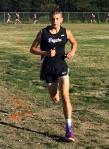 Sequim's Alec Shingleton races at a meet in Belfair on Sept. 28. Shingleton took fourth place overall as SHS's boys easily won the Olympic League meet. Photo courtesy of Michael Cobb