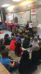 Librarian Patty Swingle visits second-grade classrooms at Helen Haller Elementary School
