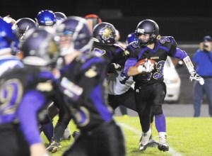 Sequim’s Gavin Velarde looks for running room against North Mason on Oct. 7