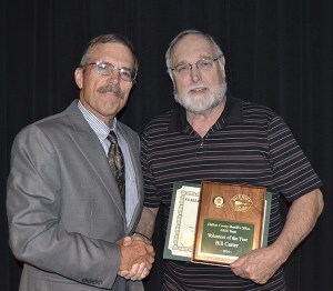 William Carter was named the Clallam County Sheriff’s Office 2014 Volunteer of the Year. Congratulating him is Sheriff Bill Benedict.