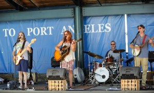 Joy in Mudville entertains the crowd at the North Olympic Discovery Marathon at the Port Angeles City Pier on June 5. The local band is set to play the City of Sequim’s Music in the Park series on Aug. 9.