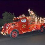 Leonard Horst, District 3 firefighter/paramedic and Explorer Post 1003 advisor, serves as one of Santa&rsquo;s elves during last year&rsquo;s Santa&rsquo;s Toy and Food Fire Brigade. Submitted photo