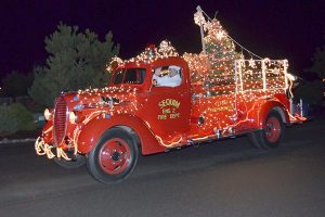 Leonard Horst, District 3 firefighter/paramedic and Explorer Post 1003 advisor, serves as one of Santa&rsquo;s elves during last year&rsquo;s Santa&rsquo;s Toy and Food Fire Brigade. Submitted photo