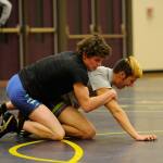 Jamie Schroepfer and Craig Baker practice a takedown in a recent wrestling practice. Sequim 
Gazette photo by Matthew Nash