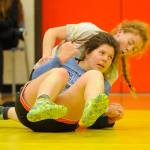 Kiara Pierson and Abi Hansted are two of a big contingent of girls on the Wolves wrestling squad. This year Sequim hosts the first Olympic League Girls Tournament on Dec. 15. Sequim Gazette photo by Matthew Nash