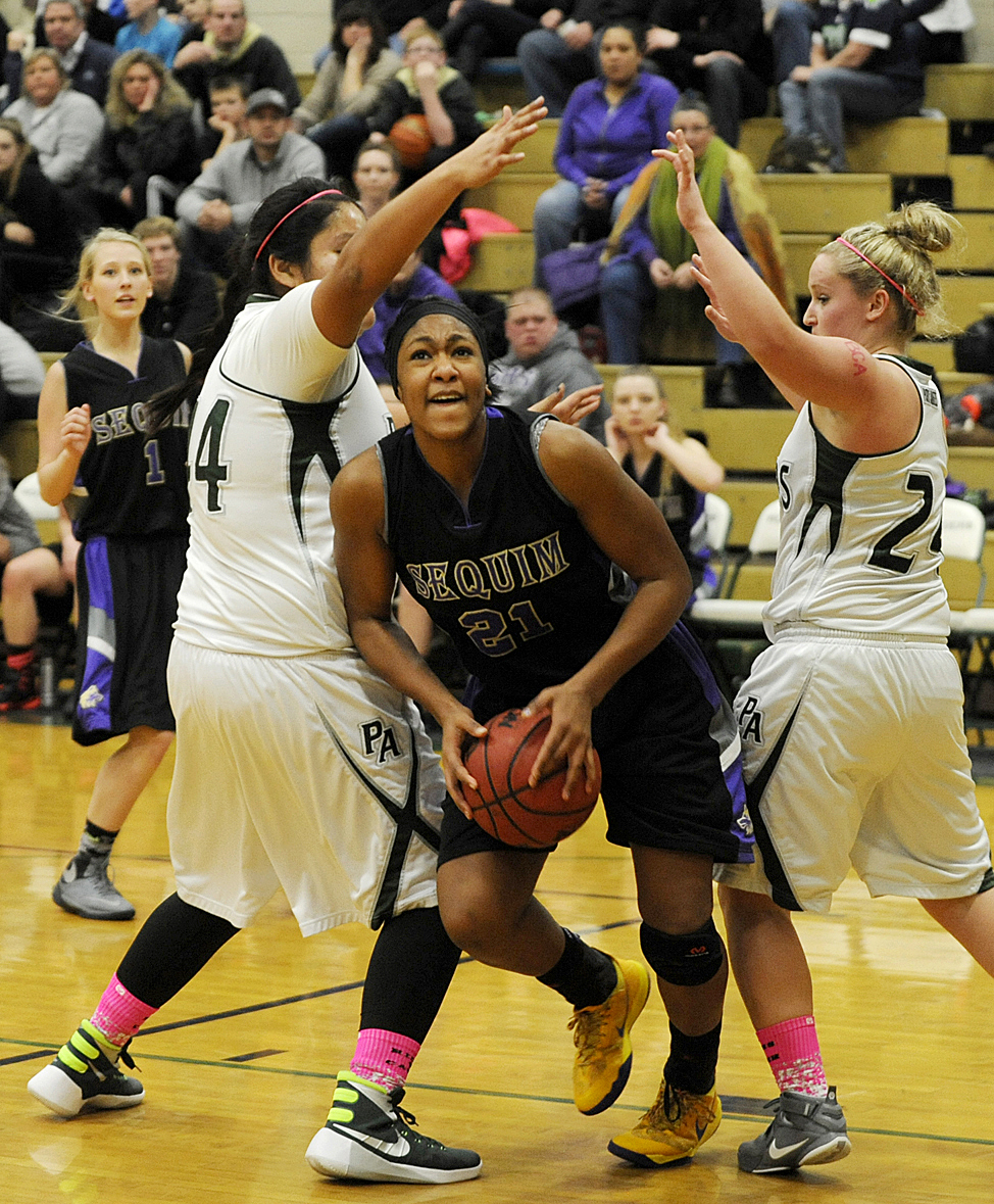 Girls basketball: New coach leads Wolves into league fray