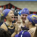 Sequim teammates, from left, Jasmine Itti, Sonja Govertsen and Sydnee Linnane celebrate one of their relay teams making the 2A state tournament at the districts meet. Not pictured is Anna Miehe. Photo by Madeline Patterson