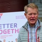 Randy Johnson, Olympic Peninsula YMCA board member, said during the grand opening of the YMCA of Sequim that the new Y is a result of everybody coming together. (Jesse Major/Peninsula Daily News)