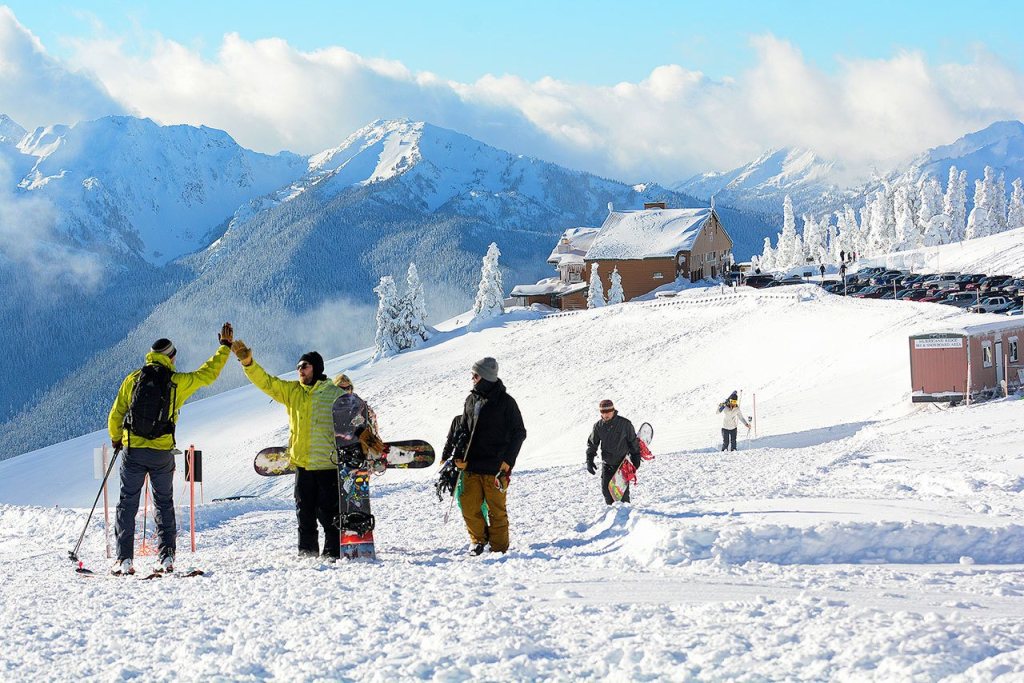 Snowboarders flocked to Hurricane Ridge on Dec. 18. (Jesse Major/Peninsula Daily News)