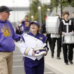 Sequim High band instructor Vern Fosket and SHS grad Sarah Doty share a laugh at the 2015 Husky Band Day in Seattle. Sequim Gazette file photo by Michael Dashiell