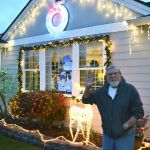 Dale Erickson welcomes people to come by and see his neighborhood&rsquo;s decorations on West Sylvester Court in Sequim off Kendall Road. He and his wife Linda received a card from girls they&rsquo;ve never met saying they visited almost nightly to wish the snowman a Merry Christmas. Sequim Gazette photo by Matthew Nash