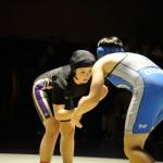 Aylee Bennett of Sequim waits to take her move against Summer Blackwell of Olympic at the Olympic League Girls Dual Meet in the varsity 145-pound match-up. Bennett won by pin in 3:02. Sequim Gazette photo by Matthew Nash