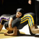 Alma Mendoza, 155, works her way toward a pin of Bremerton&rsquo;s Cynari Green in 3:10 on Thursday, Dec. 15. Sequim Gazette photo by Matthew Nash