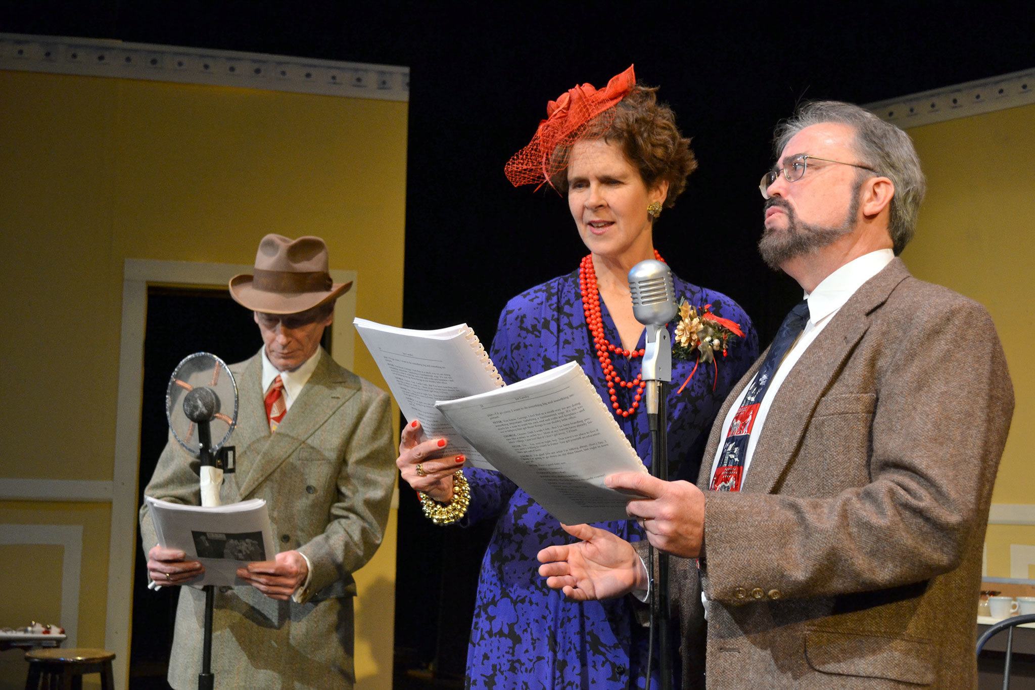 Dan DePrez, Ingrid Nixon and Keith Curtis open the beginning of Olympic Theatre Arts&rsquo; performance of &ldquo;It&rsquo;s a Wonderful Life&rdquo; during a recent rehearsal. The trio, and several others, appear in the live radio play that features an organist, sound effects and more in a New York radio studio. It runs Dec. 8-11. Sequim Gazette photos by Matthew Nash