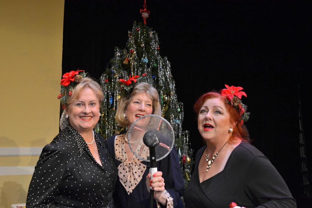 The Jingle Bells, from left, Cheryl Di Pietro, Karen Pritchard and Penny Pemberton, perform commercial breaks written by director Olivia Shea in-between scenes of &ldquo;It&rsquo;s a Wonderful Life,&rdquo; a live radio play. Sequim Gazette photos by Matthew Nash