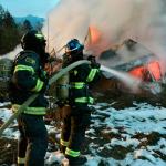 Fire engulfs structure at the old Clallam Timber log yard
