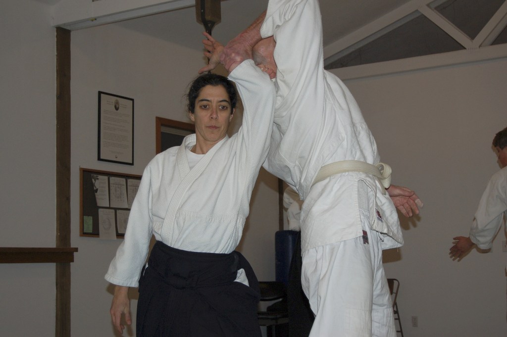 Chief Aikido instructor Neilu Naini pairs up with student Andy Brastad during a warm-up exercise at the Aikido Dojo off Carlsborg Road in Sequim. Sequim Gazette photos by Erin Hawkins