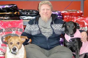 Asterix, left, store owner Craig Dotson and Audrey Hepburn will enthusiastically welcome customers to Bonita&rsquo;s Pet Supplies in Rock Plaza. Sequim Gazette photo by Patricia Morrison Coate