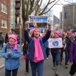 Diann Roll, left, Anne Schade, and Sue Cram clapped, shouted and rallied alongside each other as they participated in the Seattle Womxn&rsquo;s March on Saturday, Jan. 21. Sequim Gazette photo by Erin Hawkins