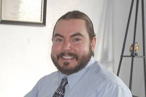 Nate Maxwell, a geriatric counselor, offers flexible hours and compassion for seniors in his office at 207 W. Spruce St., Sequim. Sequim Gazette photo by Patricia Morrison Coate