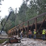 Crews continue work on placing a new bridge in Sequim Bay State Park on Jan. 19. The installation follows a federal injunction to remove culverts that obstruct salmon migration. Sequim Gazette photo by Matthew Nash