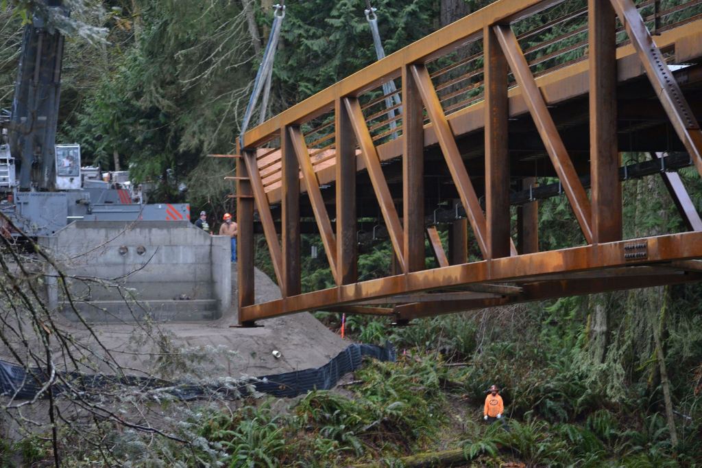 The new bridge in Sequim Bay State Park spans 210 feet in three sections and weighs 177,000 pounds. Sequim Gazette photo by Matthew Nash