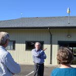 Sequim Public Works Director David Garlington discusses options for replacing the roof at the Guy Cole Convention Center on Sept. 12, 2016, during a tour for Sequim city councilors. Construction on the site began this week and is expected to finish in March. Sequim Gazette file photo by Matthew Nash