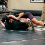 Alexi Rampp-Taft, 120 pounds, works her way to pinning Port Angeles&rsquo; Hannah Stone in 15 seconds during a JV match at the Battle for the Axe. Sequim Gazette photo by Matthew Nash