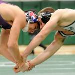 At 145 pounds, Sequim&rsquo;s Craig Baker and Port Angeles&rsquo; Ben Basden grapple in a tight match. Baker went on to win 9-5. Sequim Gazette photo by Matthew Nash