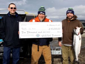 Dave Logan/for Peninsula Daily News The top three winners in the 2017 Olympic Peninsula Salmon Derby are, from left, Derek Madison of Port Angeles, third, (14.85 pounds), Tony Beam of Hansville, first, (15.25 pounds) and Ben Power, of Olympia, second (15.10 pounds).