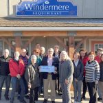 Busines: Brokers donate to Sequim Community Aid