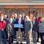 Busines: Brokers donate to Sequim Community Aid