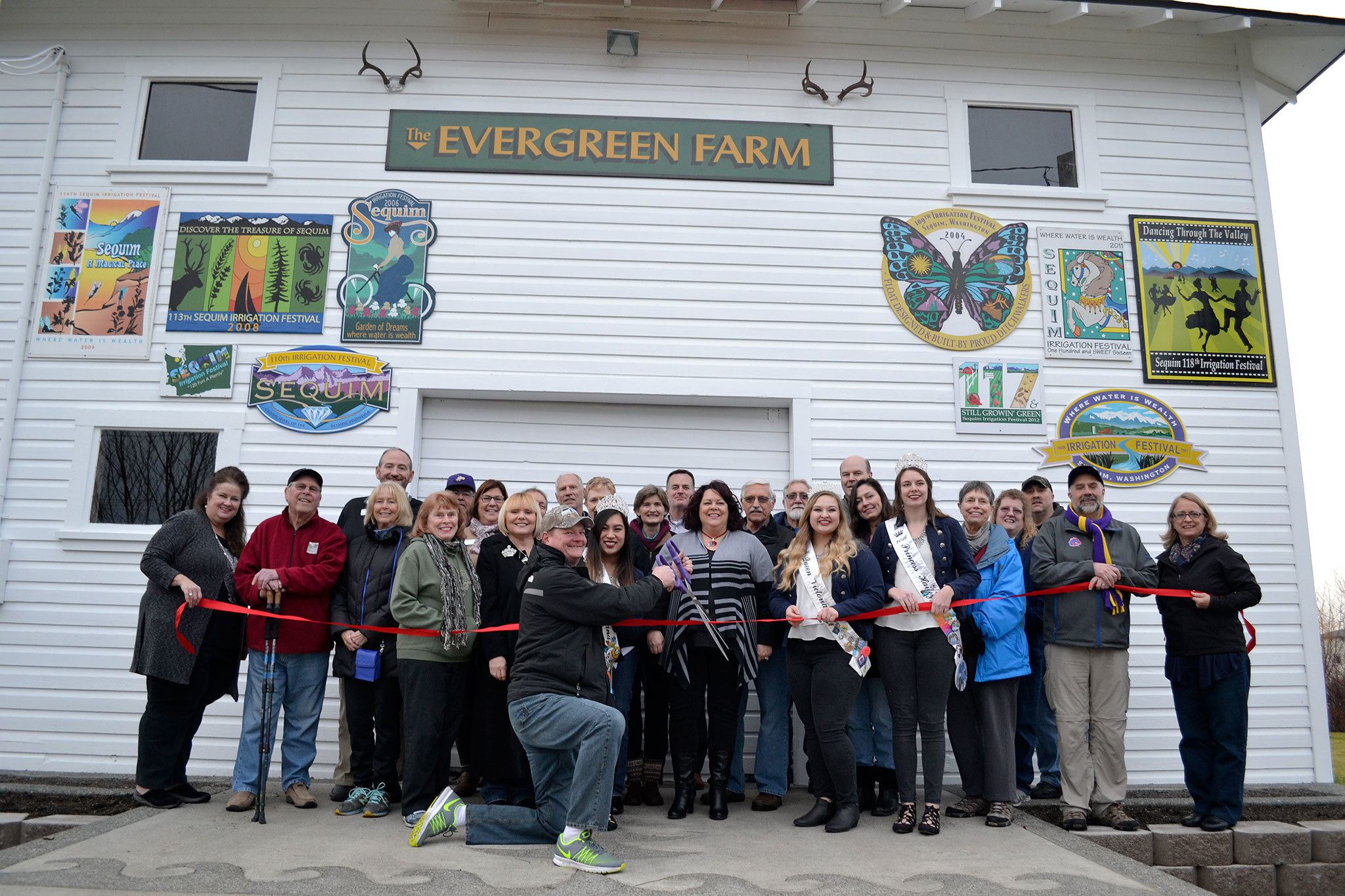 Work on repairing and repainting the Sequim Irrigation Festival&rsquo;s float barn finished in October 2016. Volunteers gathered on Jan. 28 to commemorate the work. Sequim Gazette photo by Matthew Nash