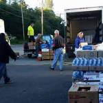 Officials with Forks Food bank, Sequim Food Bank, Salvation Army, Port Angeles Food Bank, and Serenity House load supplies from Food Lifeline on Jan. 31, at Port Angeles Food Bank. Different agencies gather there weekly to pickup supplies and distribute abundant items. Photo courtesy of Jessica Hernandez