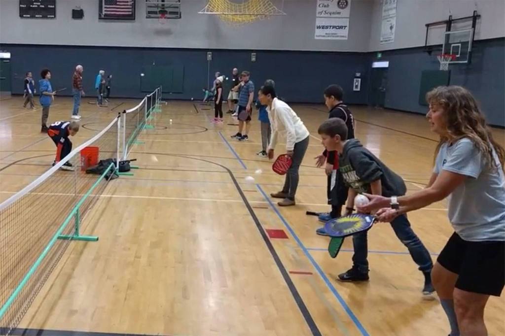 Sequim Picklers provide pickleball lessons on Tuesdays for students in the Sequim Boys & Girls Club. Photo courtesy of Charlie Pugh